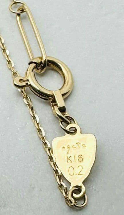 Agete K18 gold necklace with 0.2ct round diamond pendant on a delicate chain