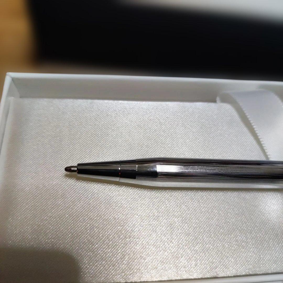 CROSS silver ballpoint pen with refill shown on white background