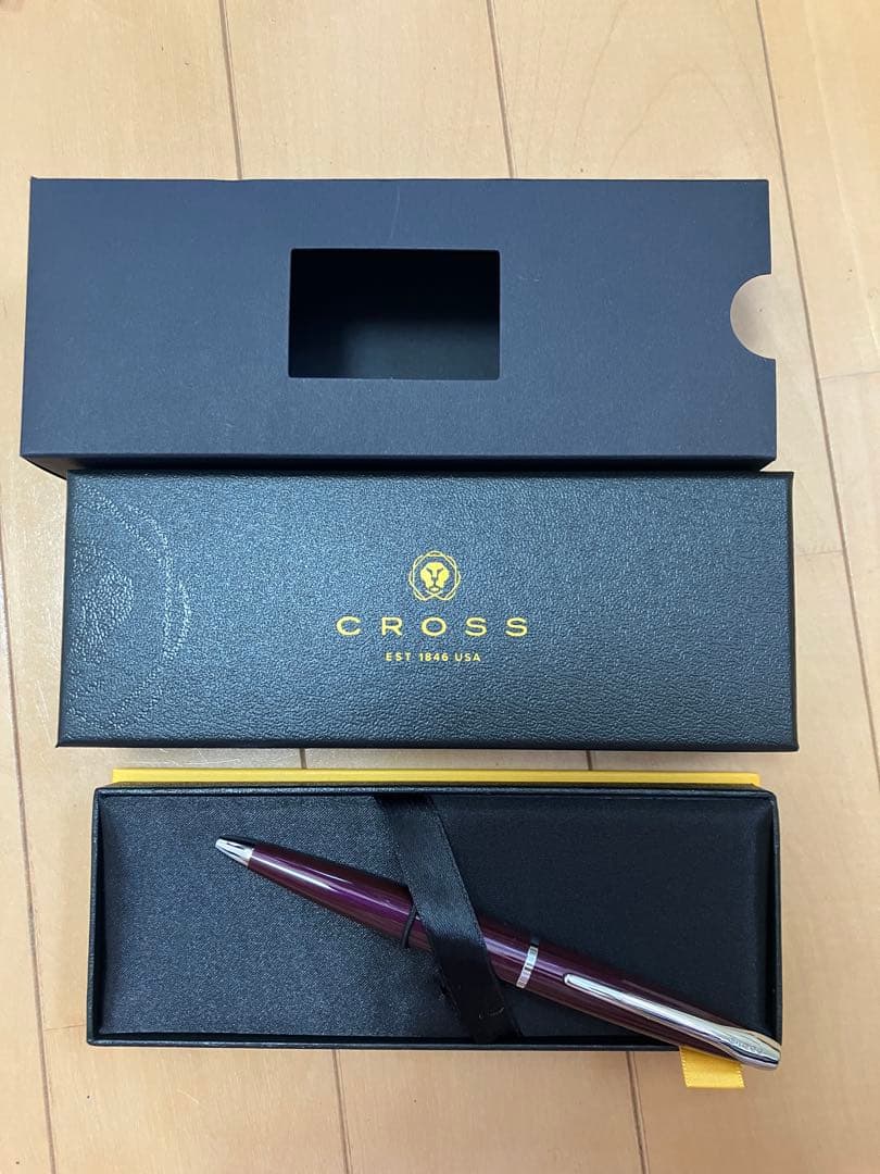 CROSS burgundy fountain pen displayed with its dedicated protective case on a white background