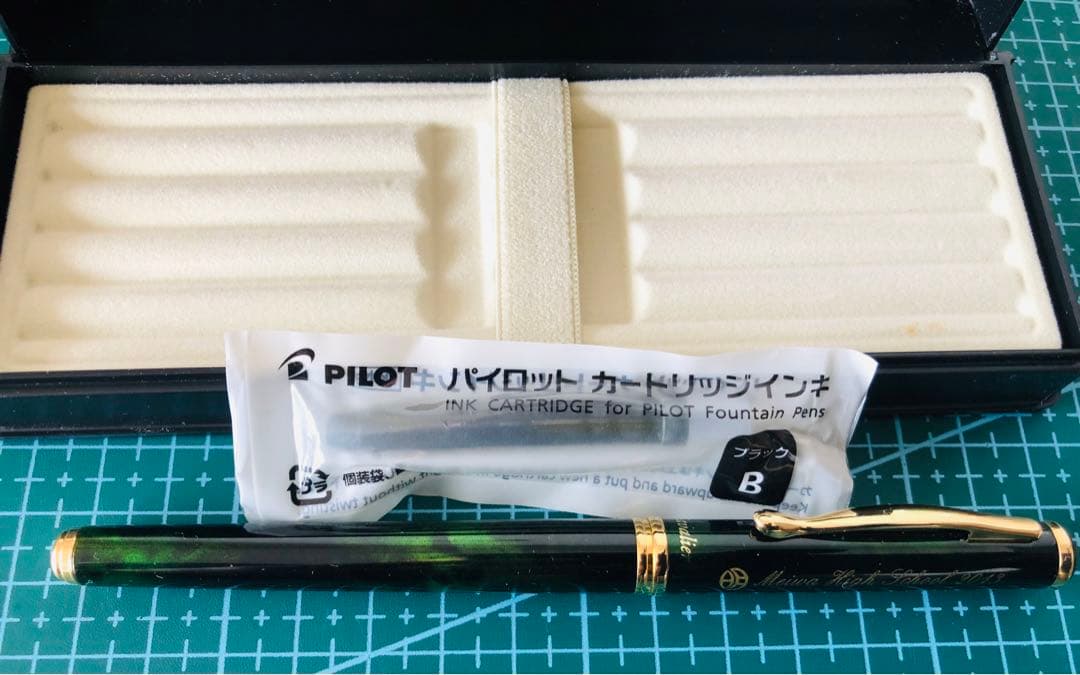 New Pilot Fountain Pen with pen cap, body, and enclosed accessories displayed on white background