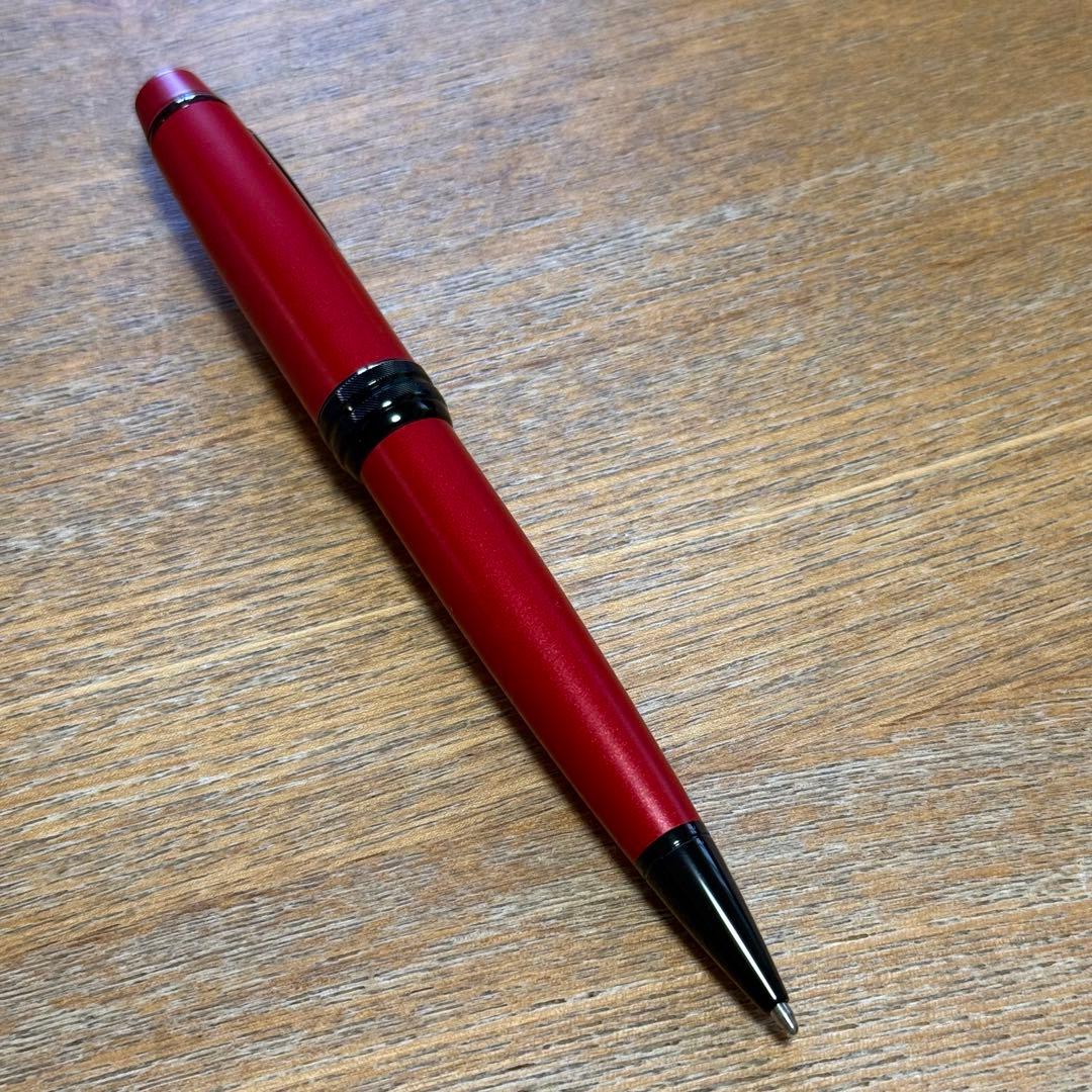Cross Bailey Matte Red Lacquer Ballpoint Pen with sleek red finish and gold trim on a white background
