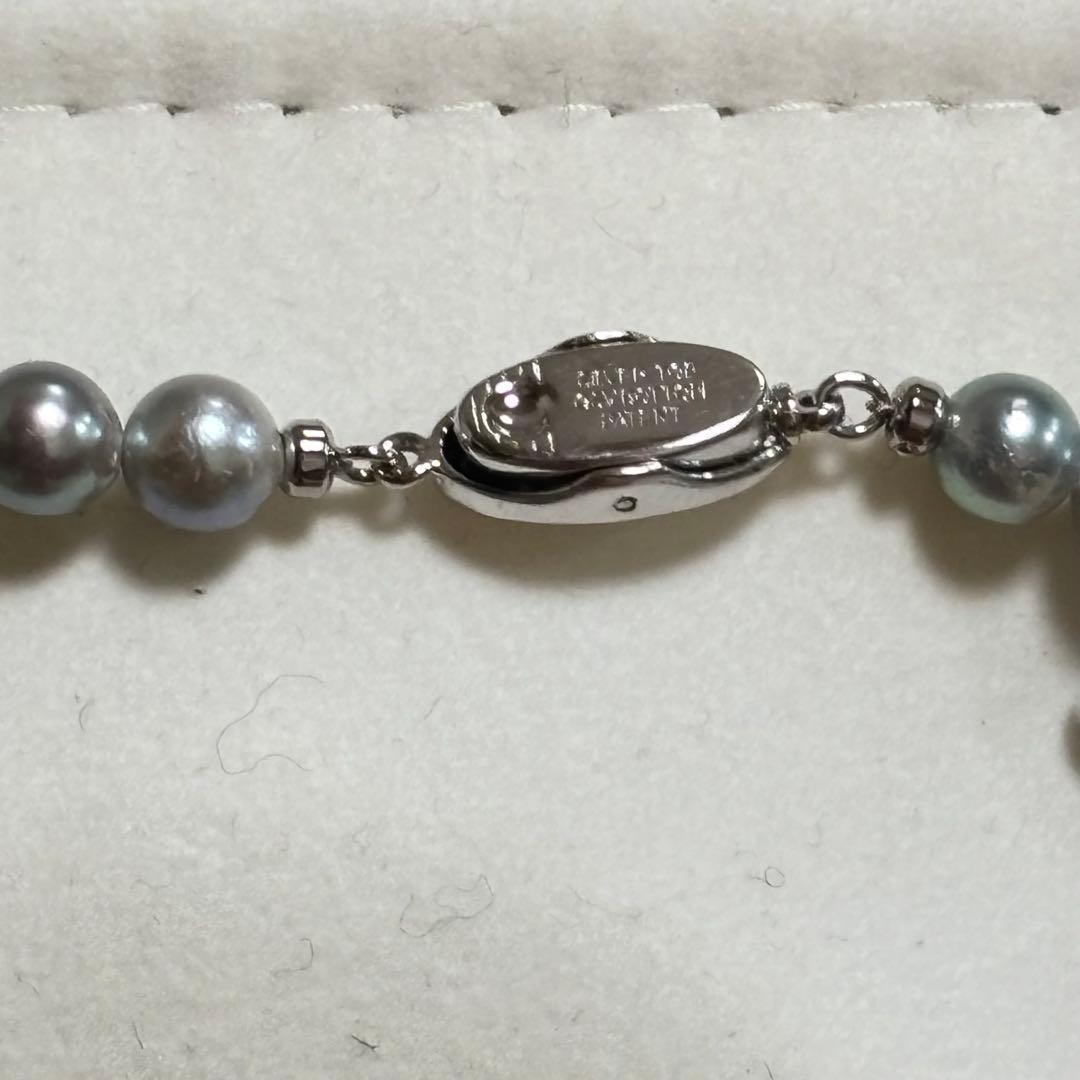 Akoya pearl necklace featuring 6-7mm pearls with a silver lock clasp, 42 cm long