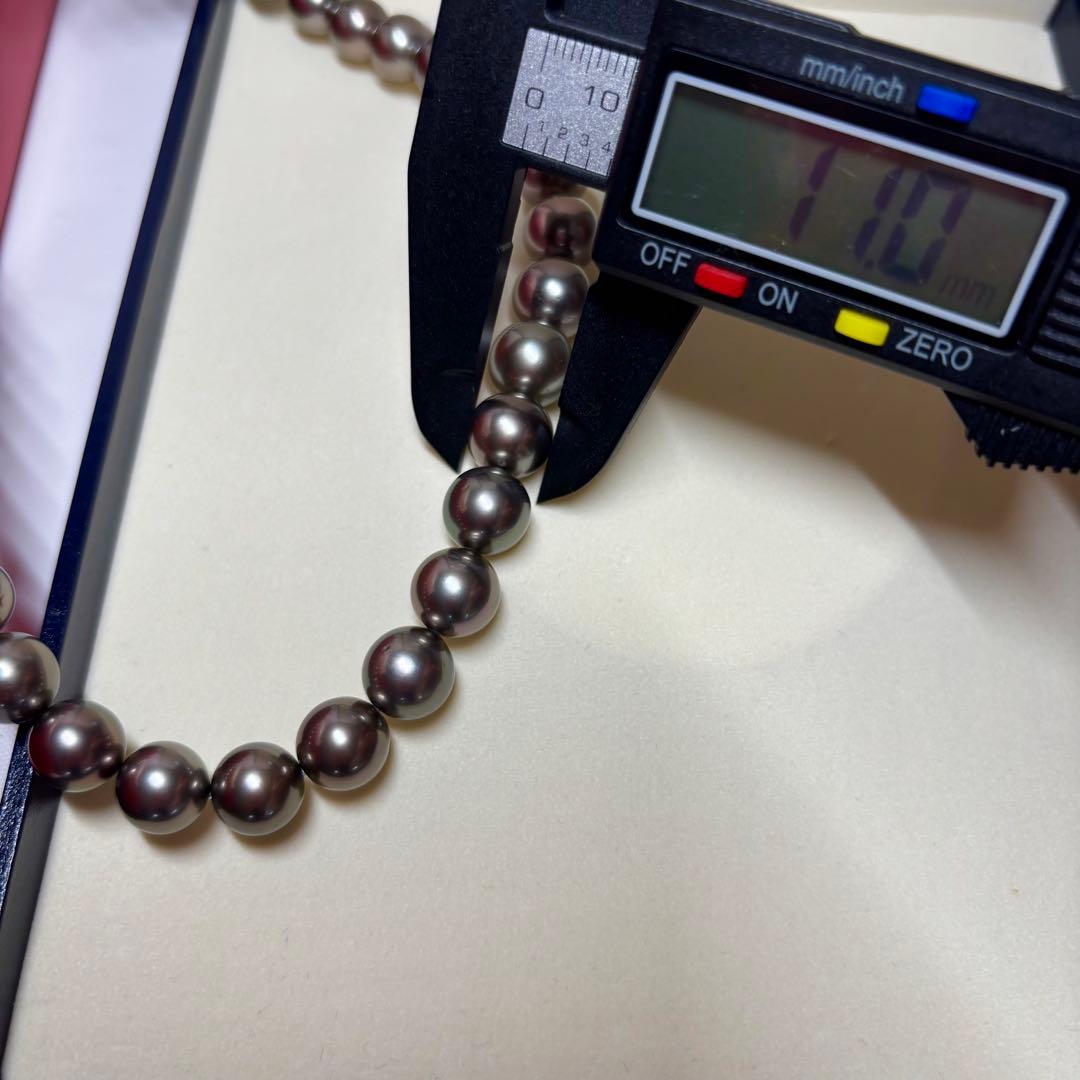 Tasaki Black Pearl Necklace featuring 9.0-11.0 mm pearls with a 41 cm length