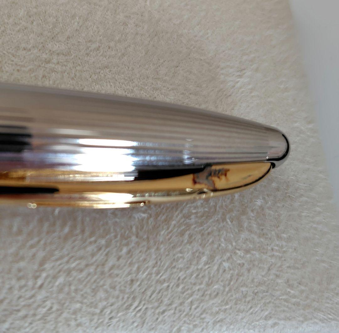 Waterman ballpoint pen with company name marking, unused with slight discoloration on clip