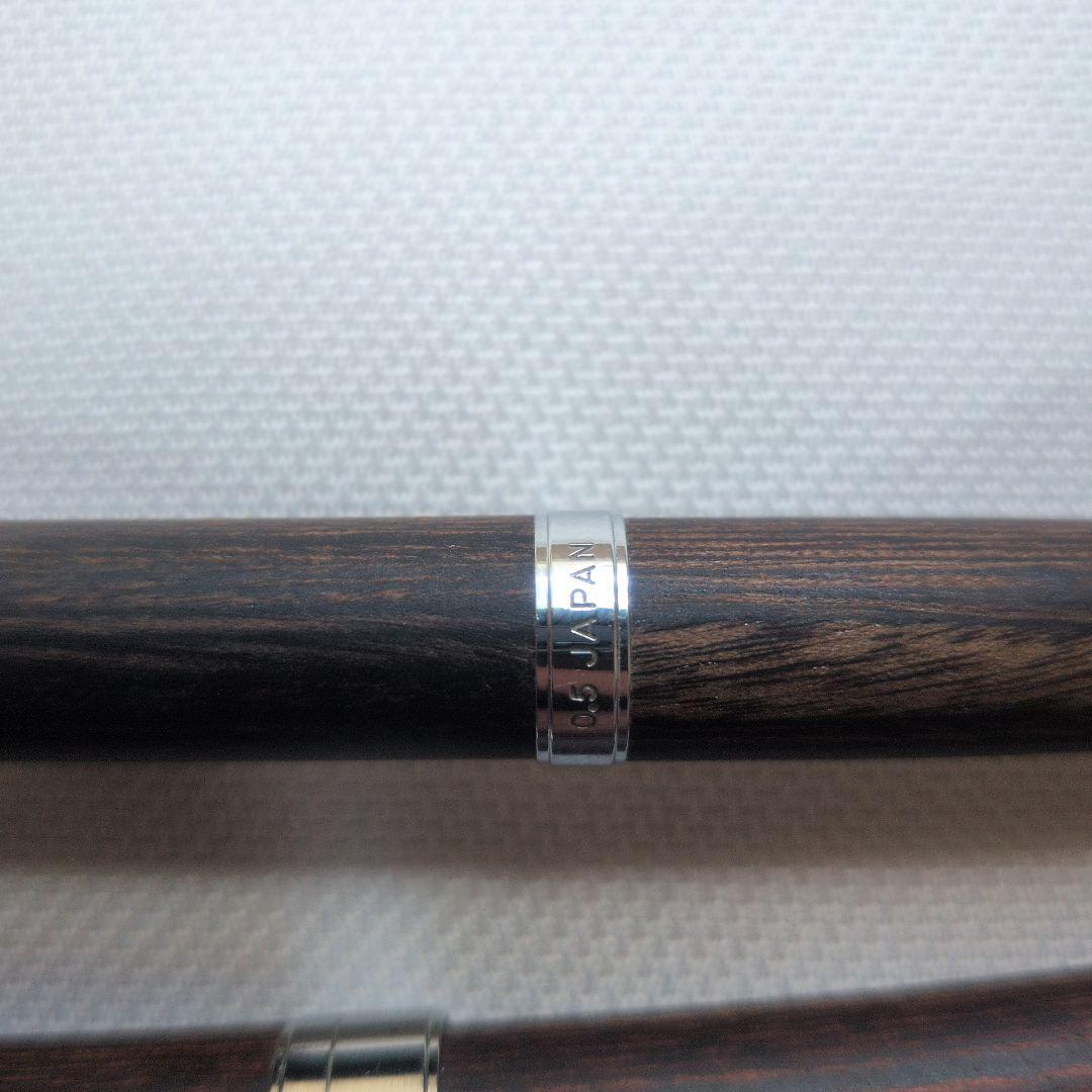 Pilot Legno set with two multifunctional ballpoint pens and one 0.5mm mechanical pencil showing black wooden design