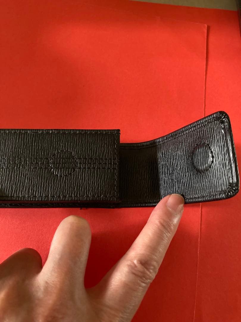 Black CROSS pen case made from embossed leather with zipper closure