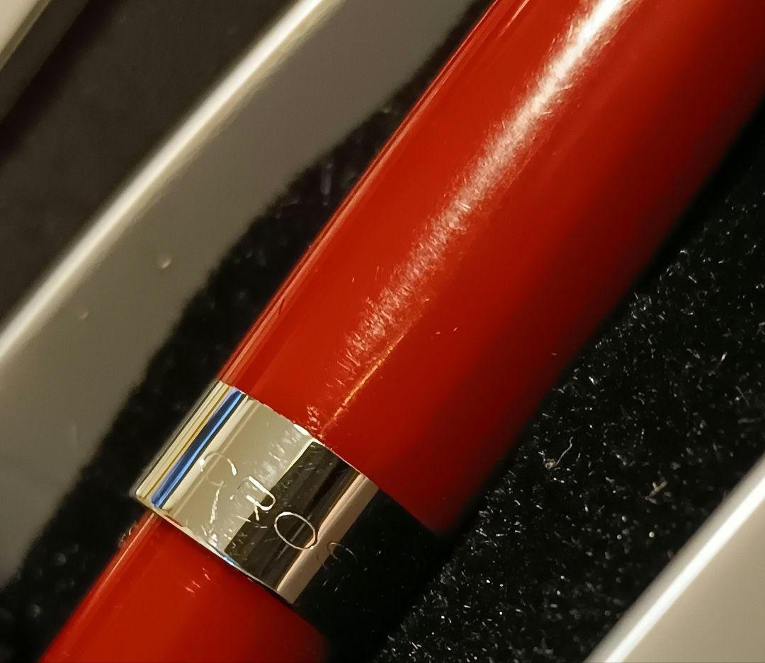 Cross ballpoint pen with red ink, twist type, 14 cm long, shown with box and refill