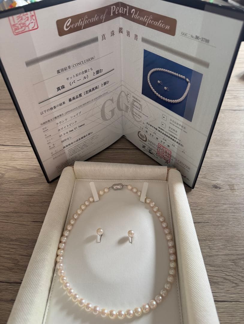 Akoya pearl necklace and earring set with round white pink Hanadama pearls and silver clasps