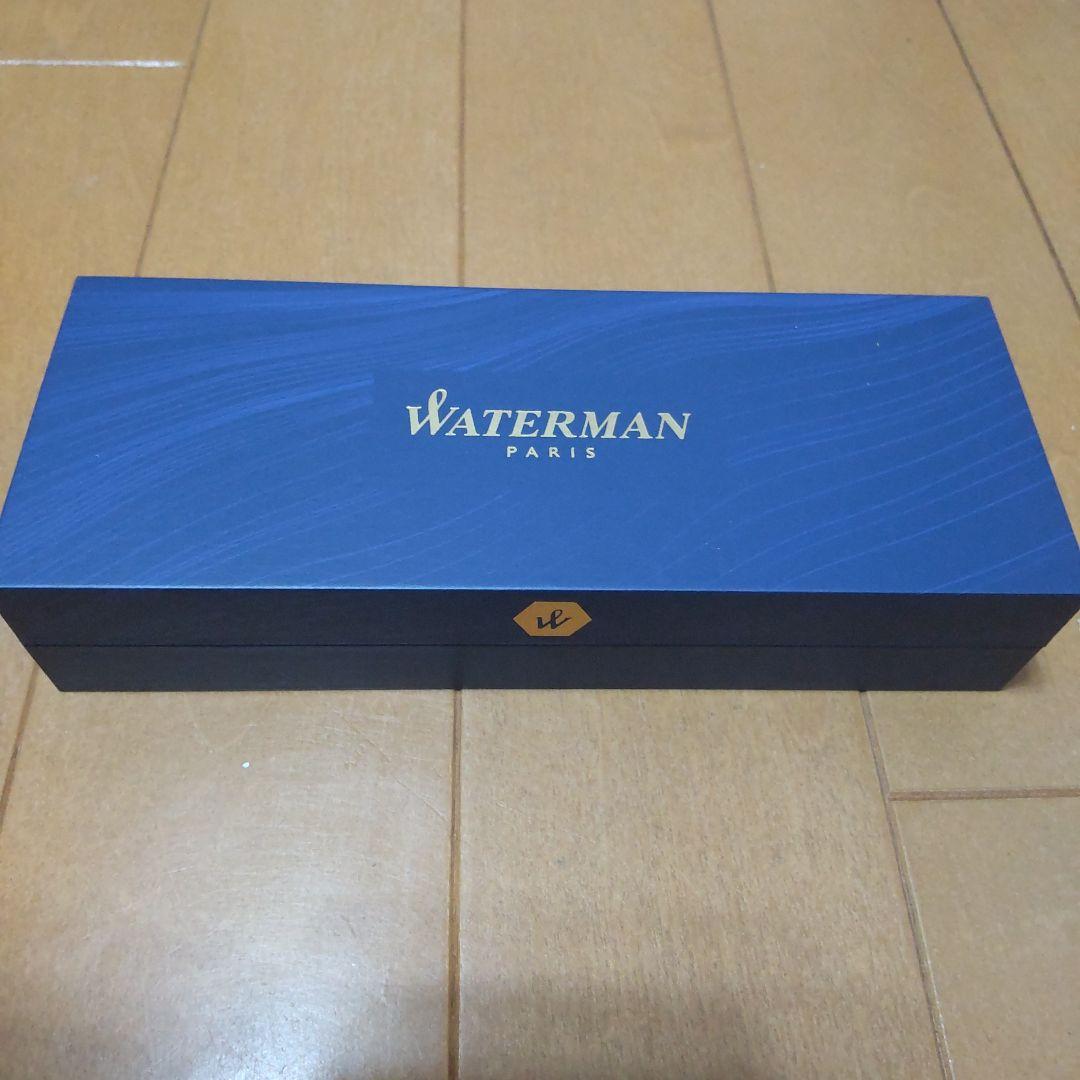 Waterman ballpoint pen with sleek design and polished finish, shown with original box