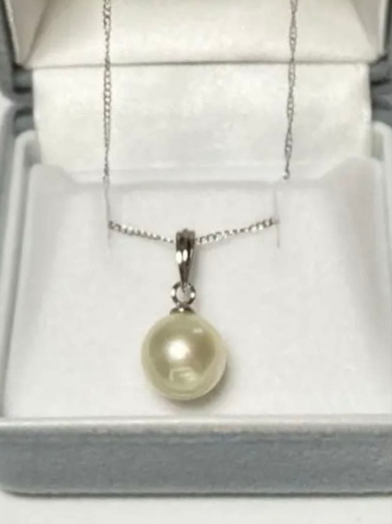 White Akoya Pearl Pendant Top featuring a 9.4mm white pearl with silver pendant banger and hallmark