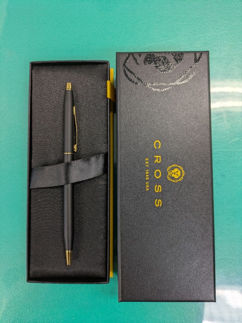 CROSS black metal ballpoint pen with gold accent shown with dedicated case