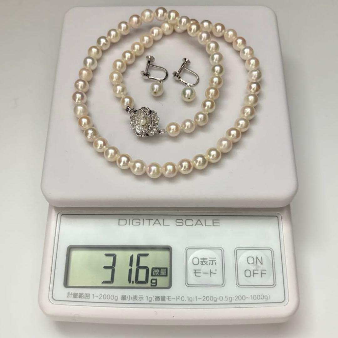 Aurora interference color Akoya pearl necklace and matching earrings with round white pearls and silver accents