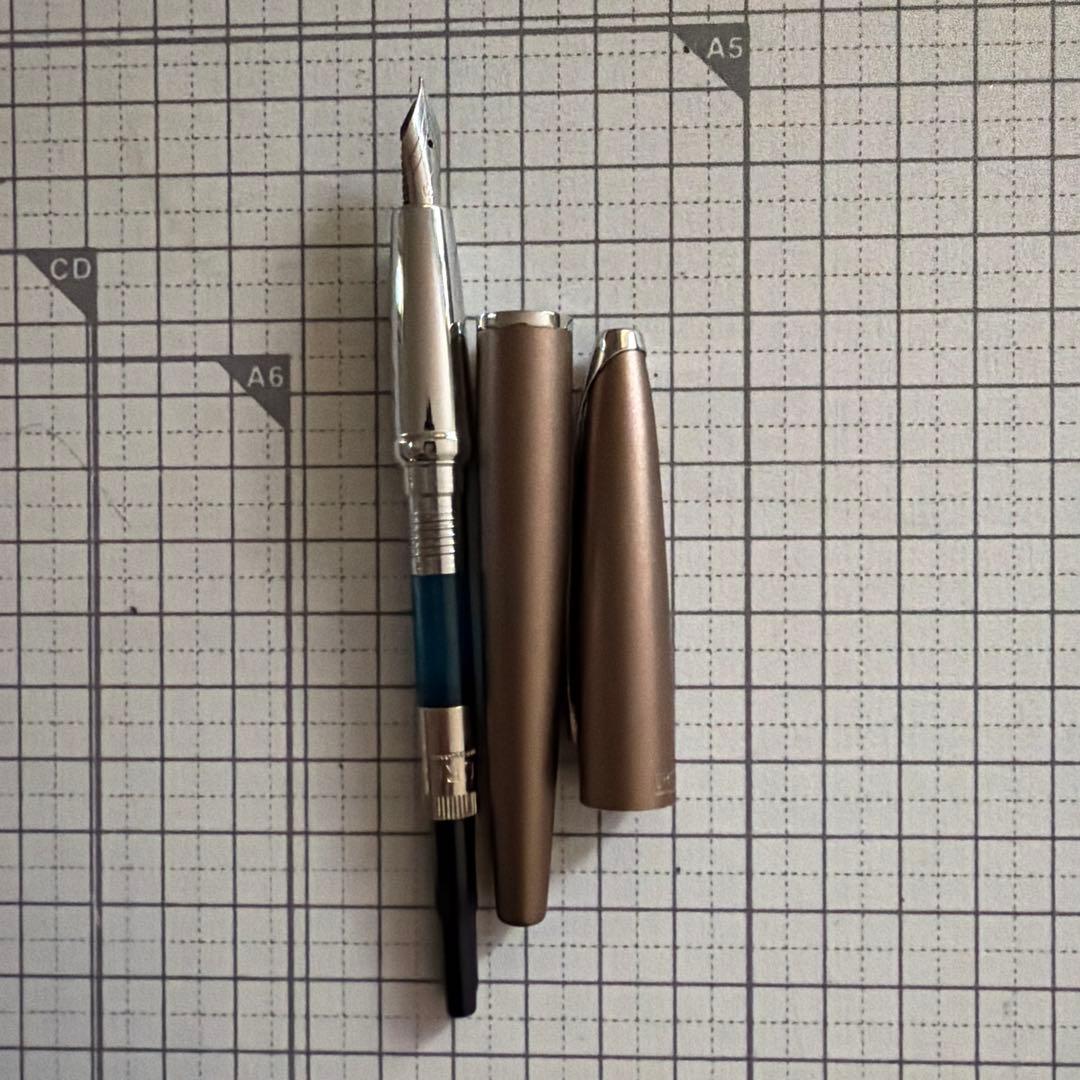 CROSS Brown Metal Fountain Pen with XF nib and brown metal finish showing cap type design