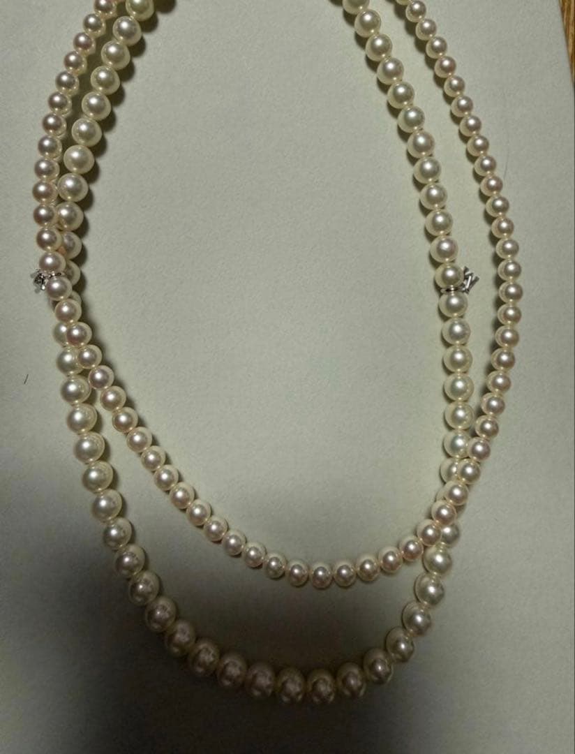 Mikimoto Akoya pearl necklace 43cm with 6.0−6.5mm pearls and silver clasp on white background