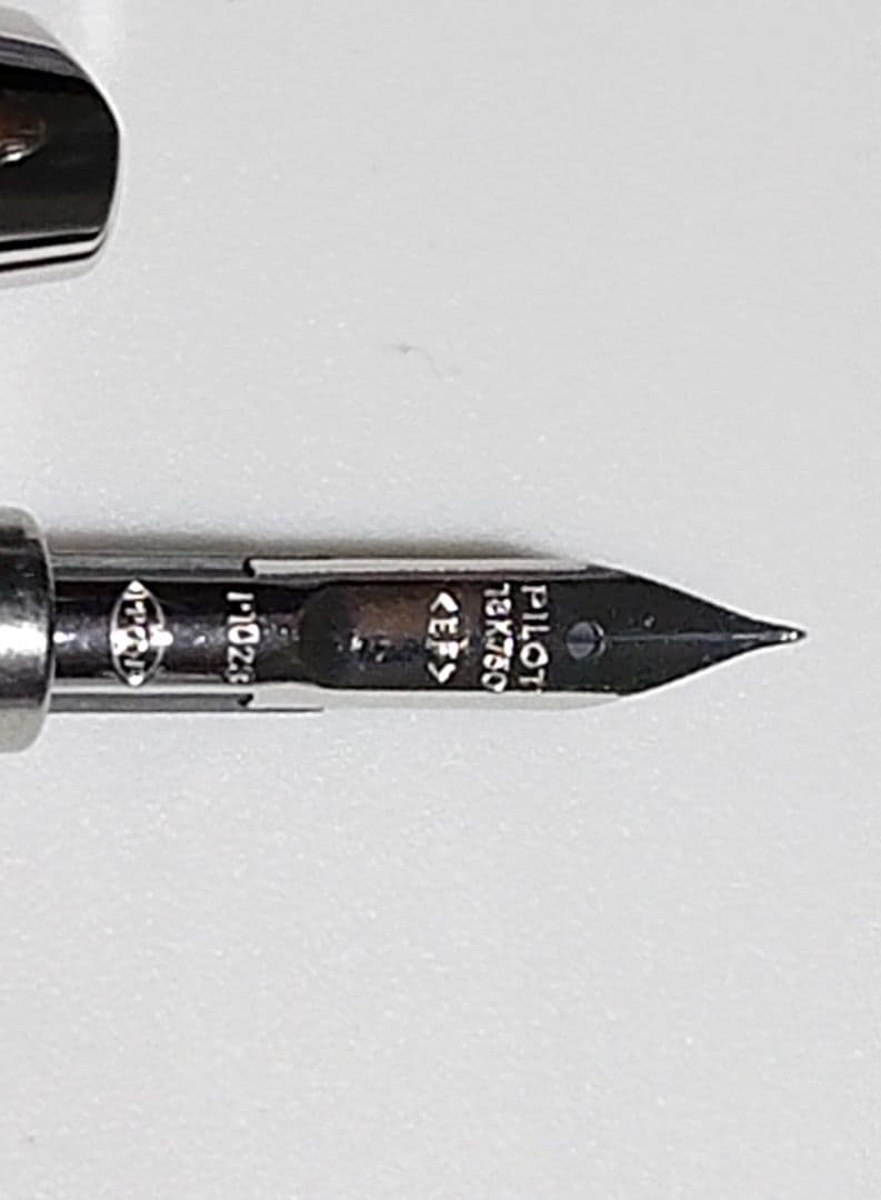 PILOT Capless Black fountain pen with extra fine nib shown with case and instruction manual