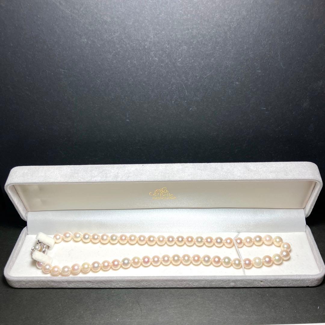 Akoya pearl necklace with 7.5-8.1mm pearls, 42cm length, featuring a silver stamped clasp