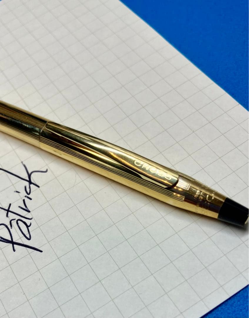 United States Cross Company slim gold ballpoint pen with black ink and sleek slim design