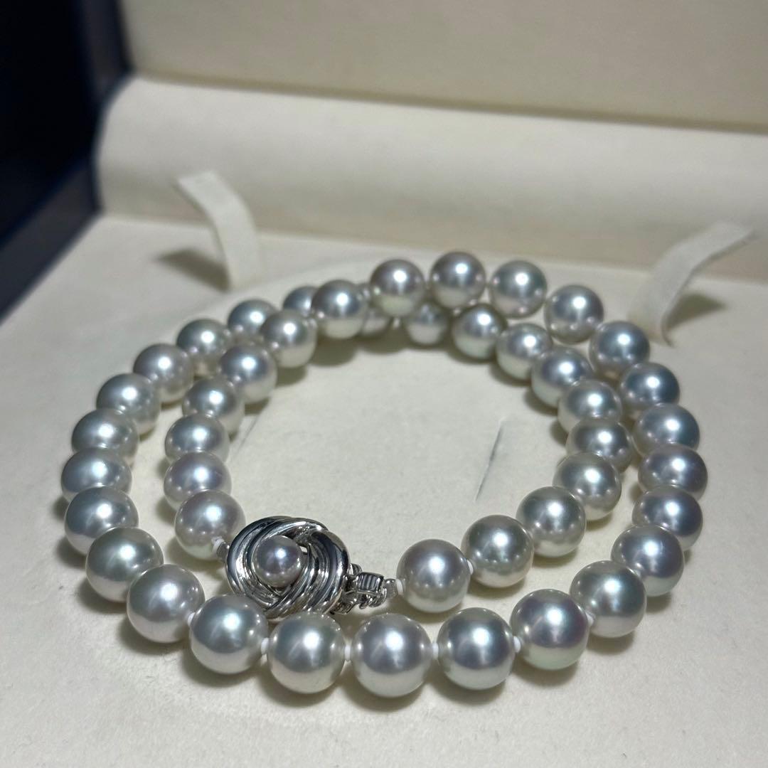Tasaki Akoya pearl necklace with 8.5-9.0mm pearls and silver clasp on a white background