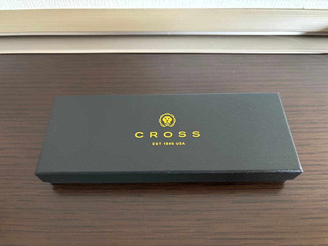 CROSS blue metal ballpoint pen displayed with included gift box