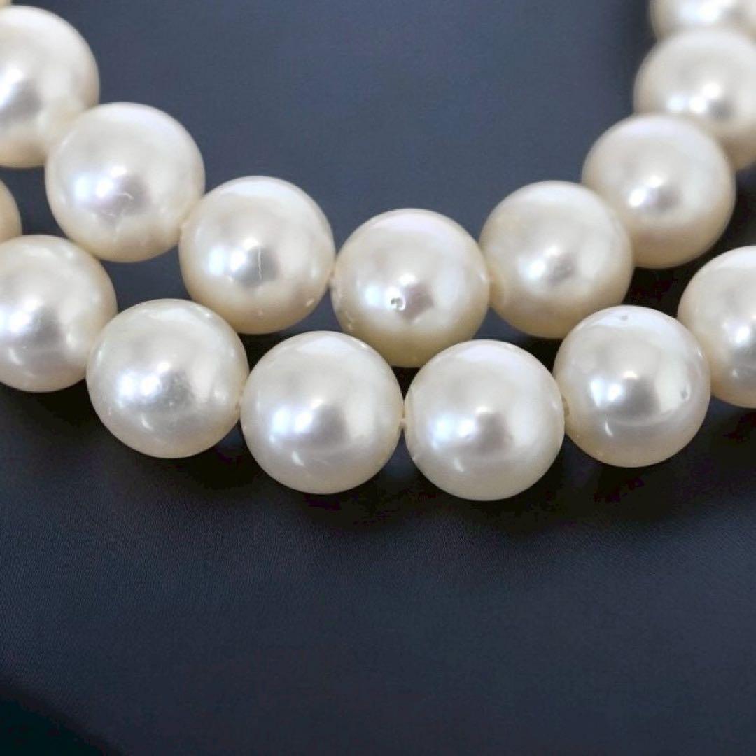 Highest Peak Tasaki Akoya pearl necklace with 7.5-8 mm round pearls on a silver chain, 42 cm length