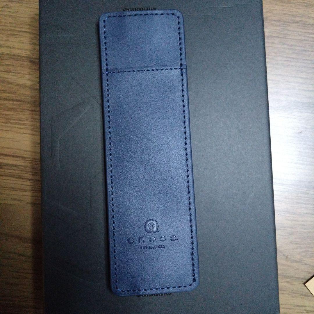 New CROSS navy leather case with matching ballpoint pen displayed on white background