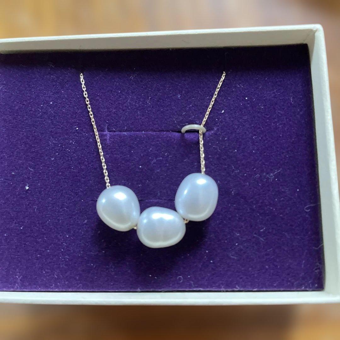 agete K10 necklace featuring a freshwater pearl with adjustable chain length and silver markings