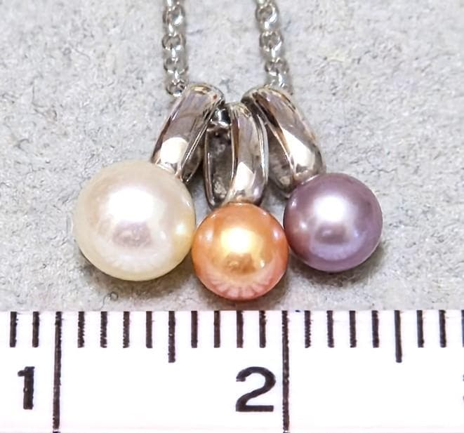 Tasaki Pearl necklace with three multi-color baby pearls on a silver chain about 42cm long
