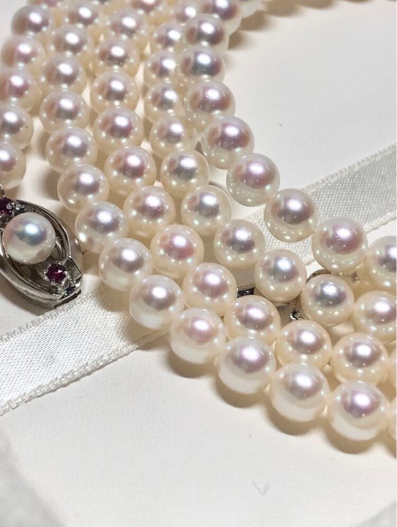 Long Akoya pearl necklace with white round Hanadama pearls measuring 6.0-6.5 mm on K14WG chain