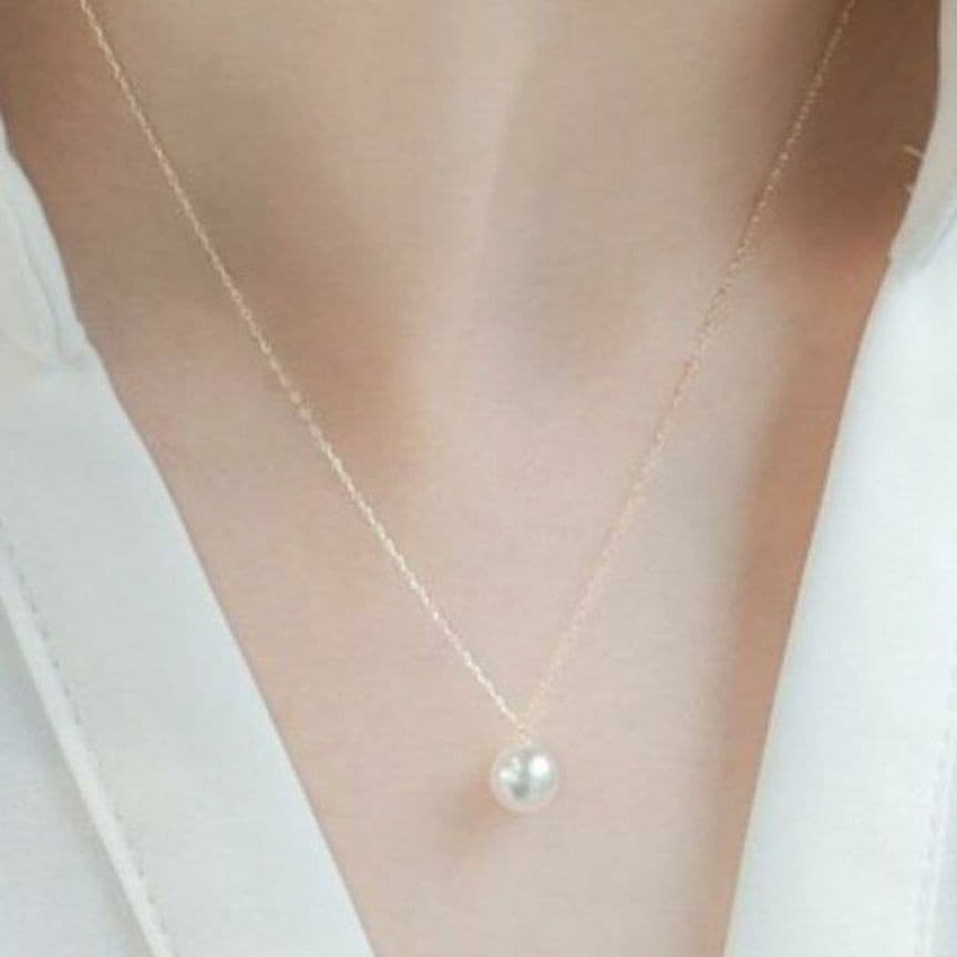 Oyster pearl necklace featuring 7mm Akoya pearls with a 36-40 cm adjustable K18 gold chain