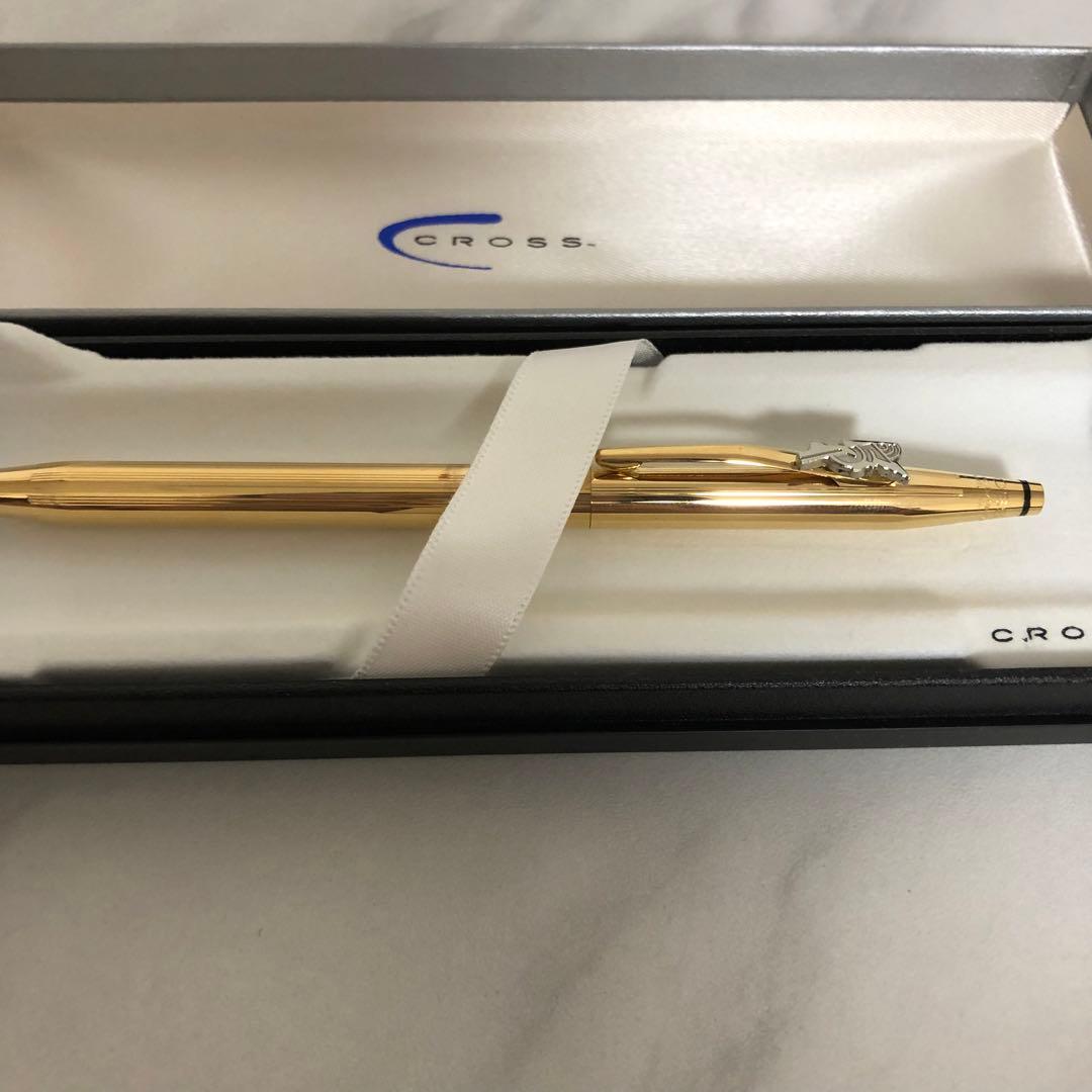 CROSS Ballpoint Pen with sleek silver barrel and black ink tip on white background