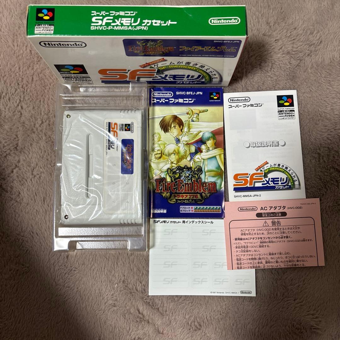 Fire Emblem Thracia 776 SNES cartridge with outer box, instruction manual, and plastic case