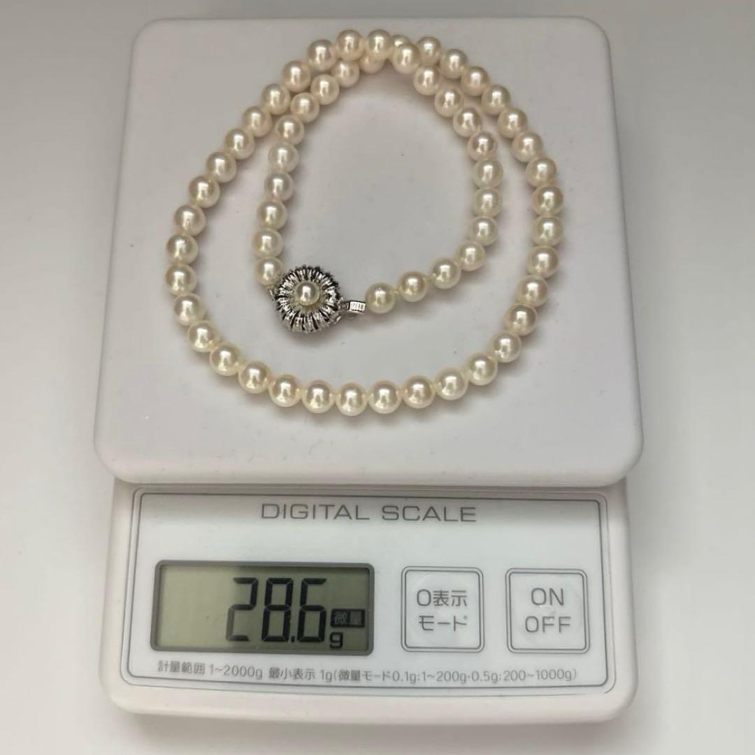 Akiya white pearl necklace with 6.5-7.0mm pearls measuring 42 cm length on a white background