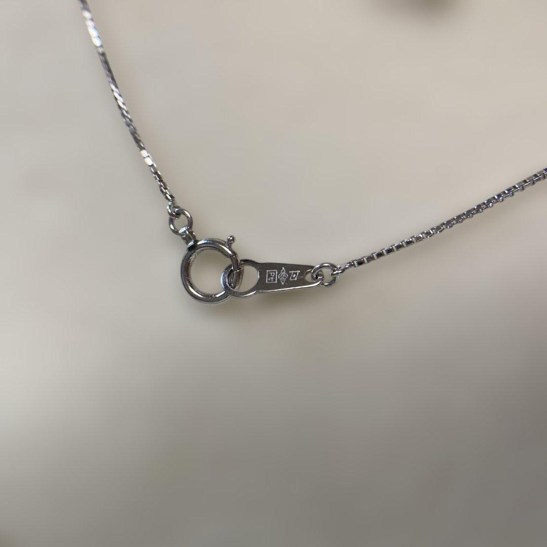 Tasaki platinum necklace with 10mm large pearl and 4 square cut diamonds on 40 cm chain