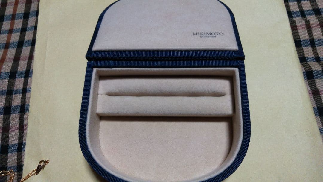 Mikimoto pearl necklace with gold and silver chain and 25mm by 15mm pearl pendant