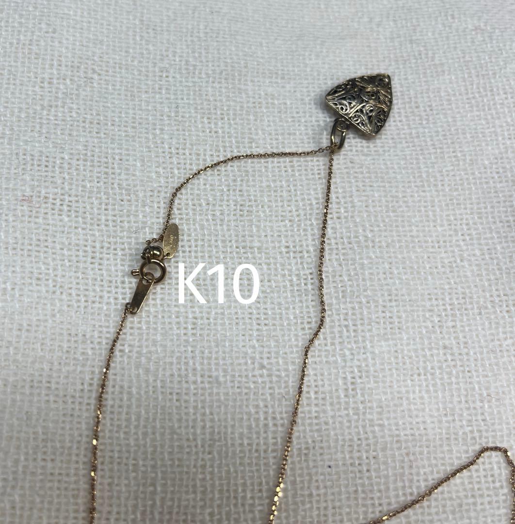 Agete necklace featuring a shell mark charm on a 41 cm chain displayed on white background