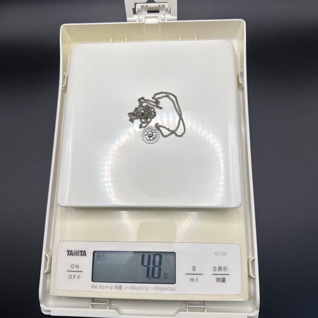 Mikimoto XXV silver wedding anniversary pendant with oxalis motif and pearl on a 46cm German silver chain