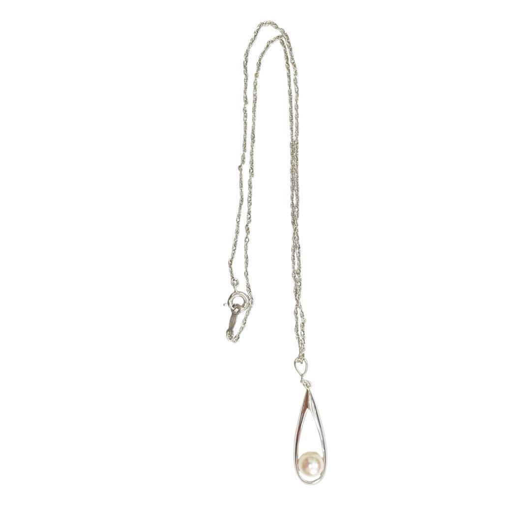 Mikimoto 1P pearl necklace with 6.8mm pearl and 40cm silver chain on white background