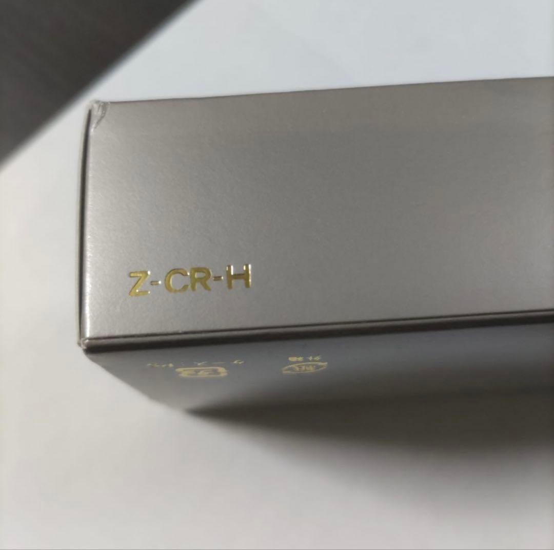 New Pilot Graice fountain pen in black and gold with 14k gold nib shown uncapped and writing