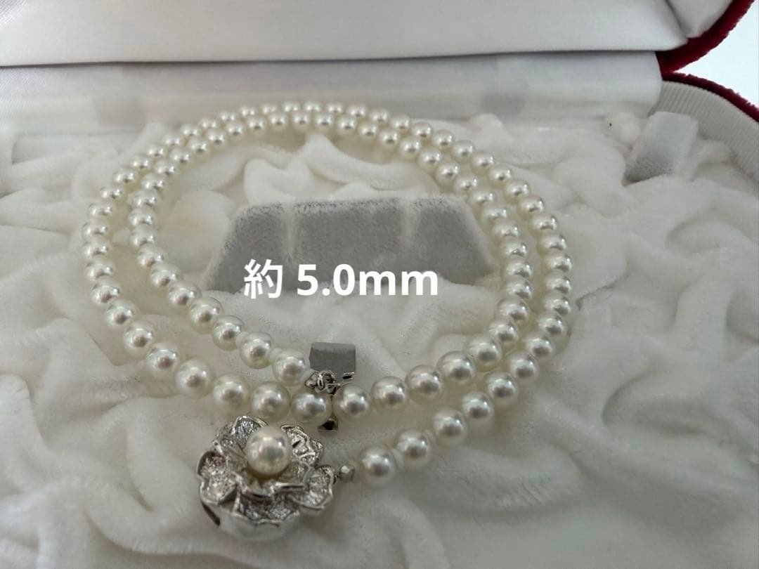 Two-piece Akoya pearl necklace with white pearls sized 8.5-9.0mm and about 5.0mm on silver stamp