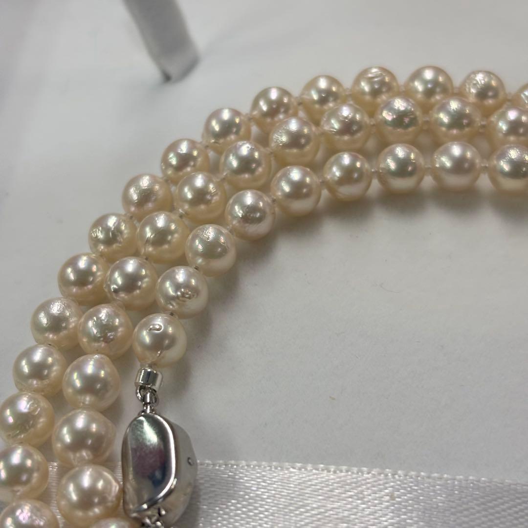 Akoya pearl necklace with 7-7.5mm baroque pearls, 80cm long featuring a 925 silver clasp and natural wrinkles
