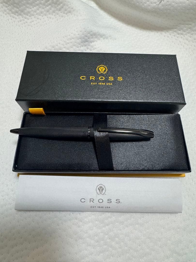 Kuro Cross ballpoint pen with black ink and high-quality finish shown on white background