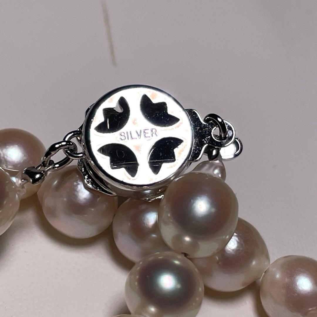 Akoya Pearl Hanjudekira semi-round necklace with 6.3-7.0mm white pearls on silver chain approximately 47.7cm long mark O588