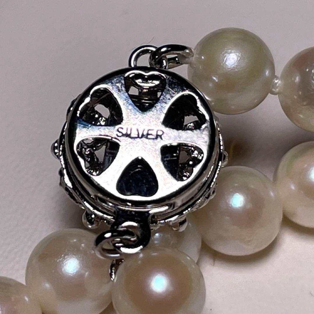 Irregular Ise-Shima Akoya pearl necklace with 5.9-6.3mm round pearls on a silver chain, 42.2 cm long