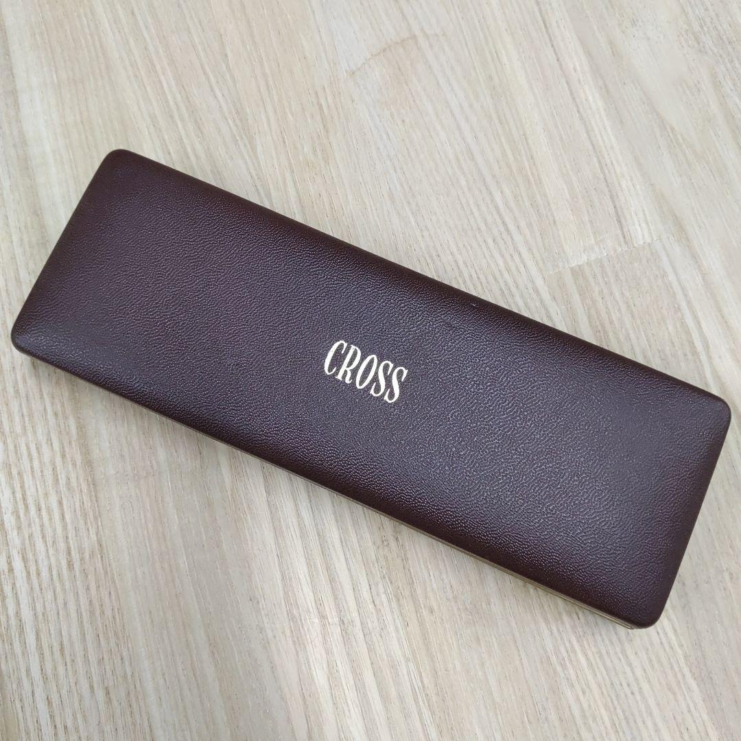 Cross gold ballpoint pen made of metal displayed with its protective case