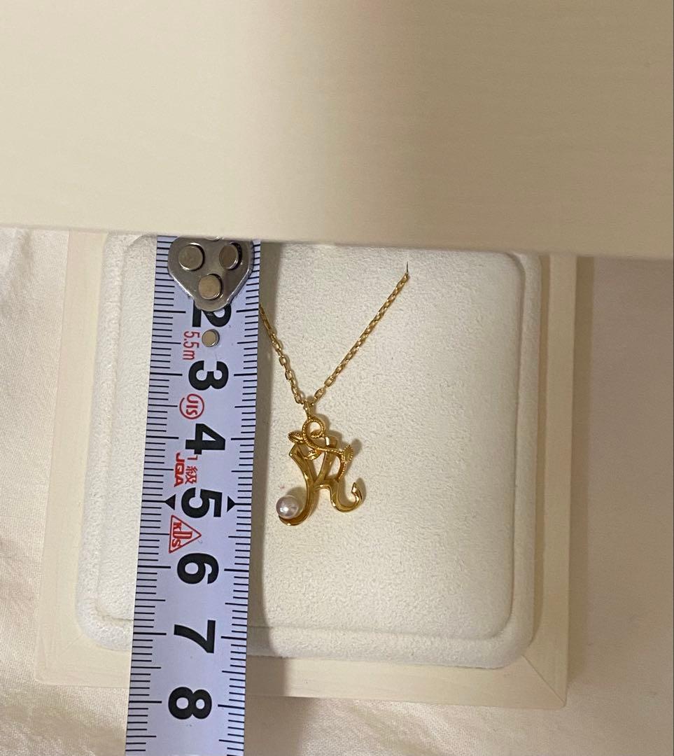 MIKIMOTO K18 necklace featuring a single pearl on a delicate gold chain