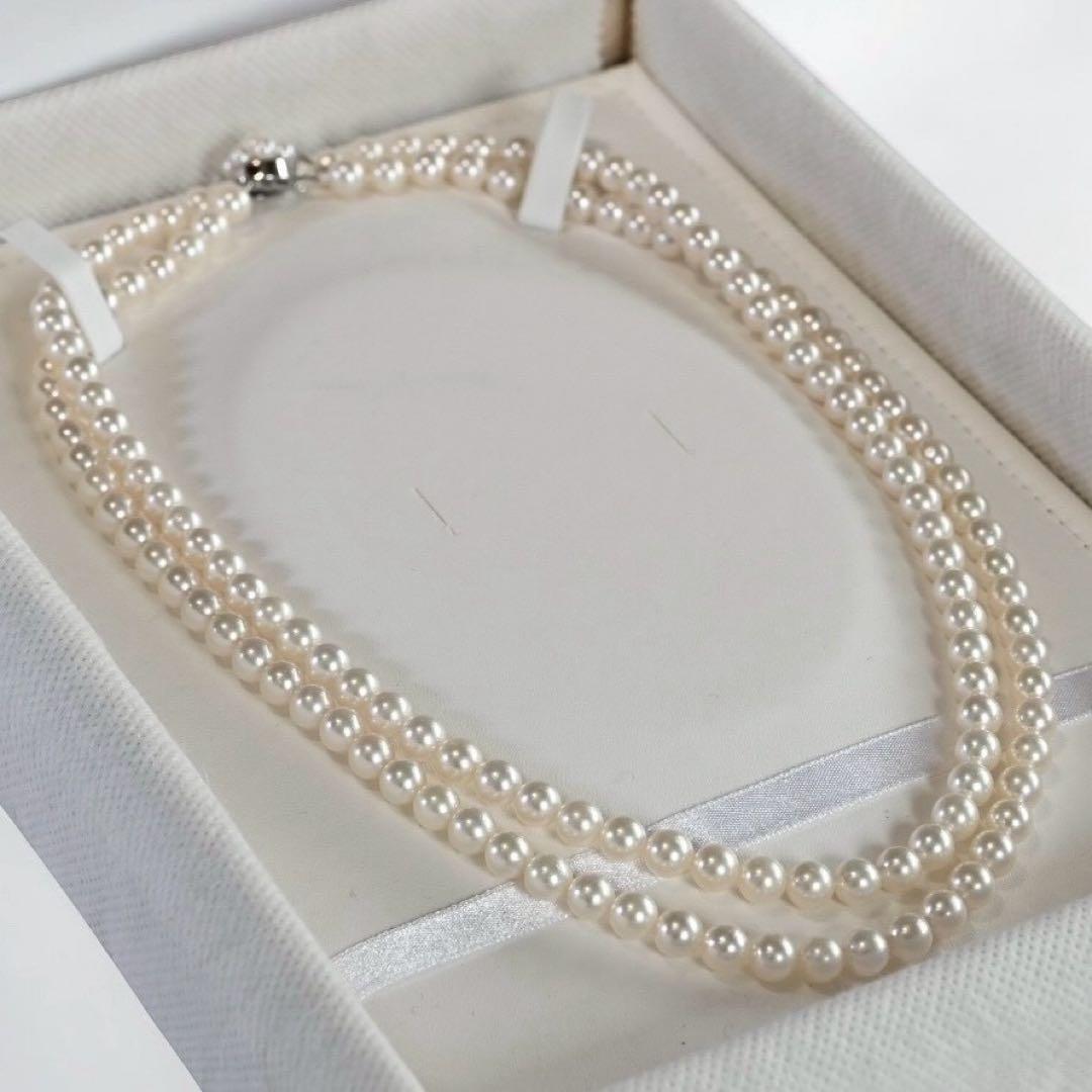 Double strand Tasaki Akoya pearl necklace with round 6.1-6.3 mm pearls and silver clasp