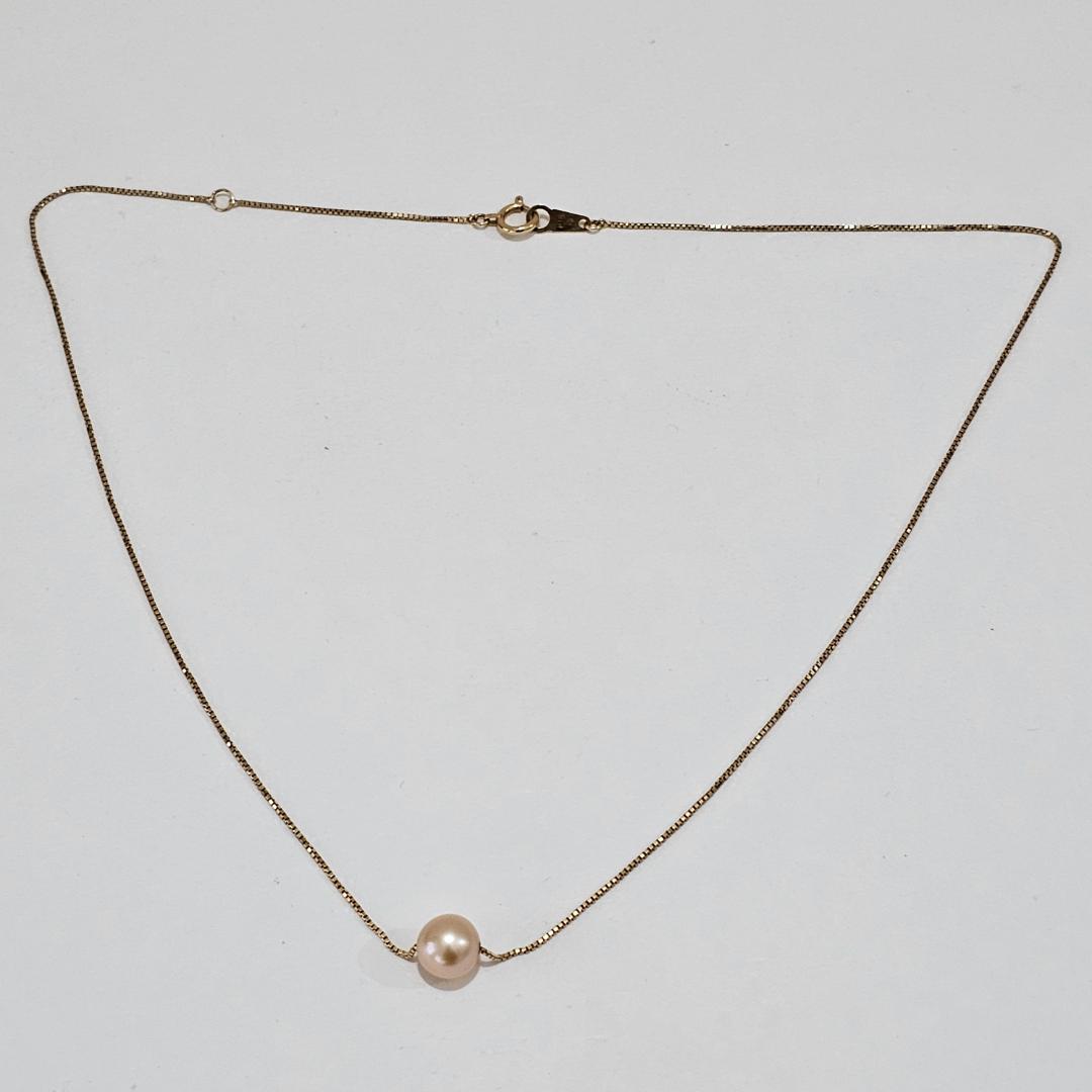 1890 Tasaki pearl necklace with 7.1mm pearl set in K18 yellow gold, 40cm chain length