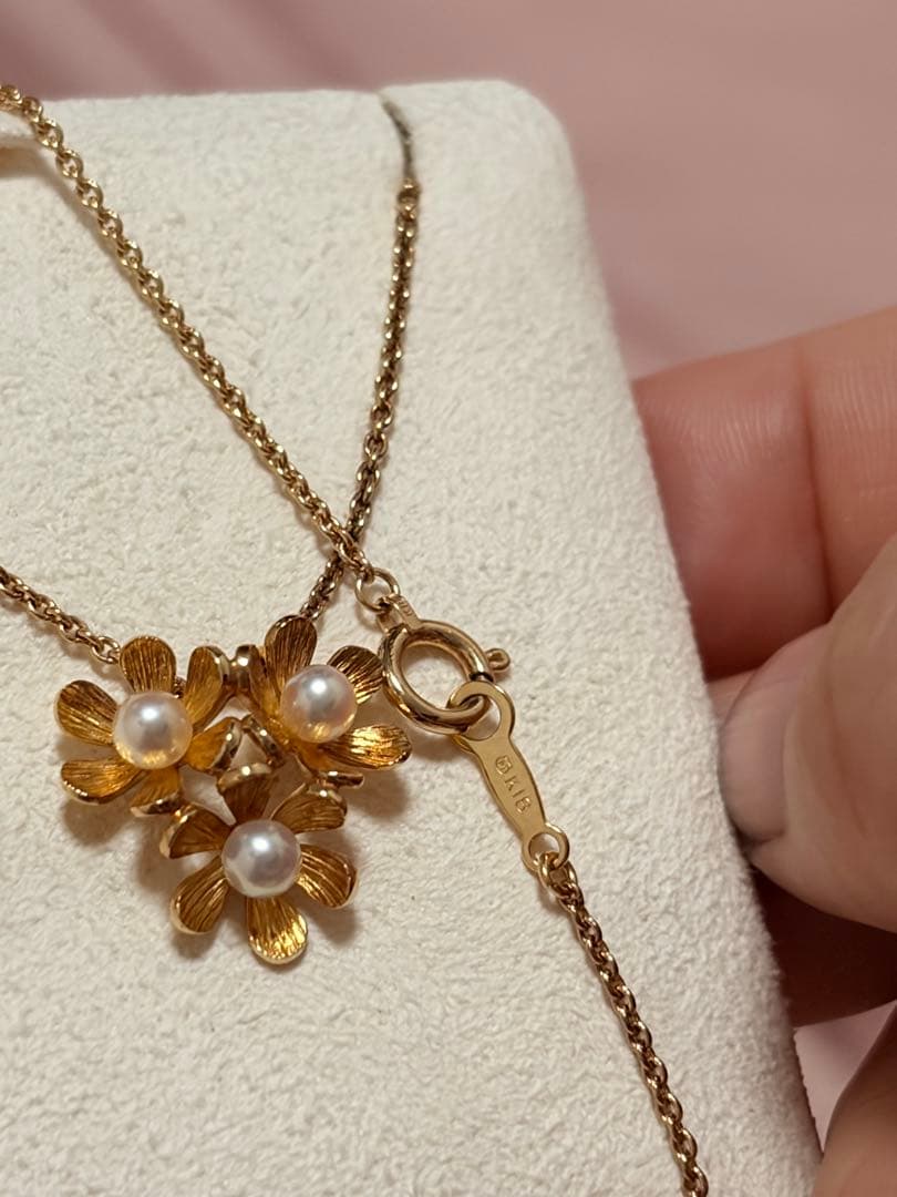 Mikimoto K18 gold baby pearl necklace with 3-row flower motif design weighing 4.5 grams