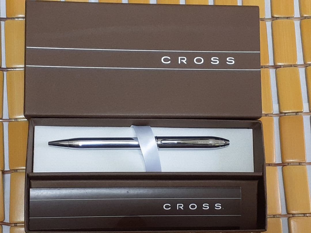 New Cross ballpoint pen with silver color body shown on plain background