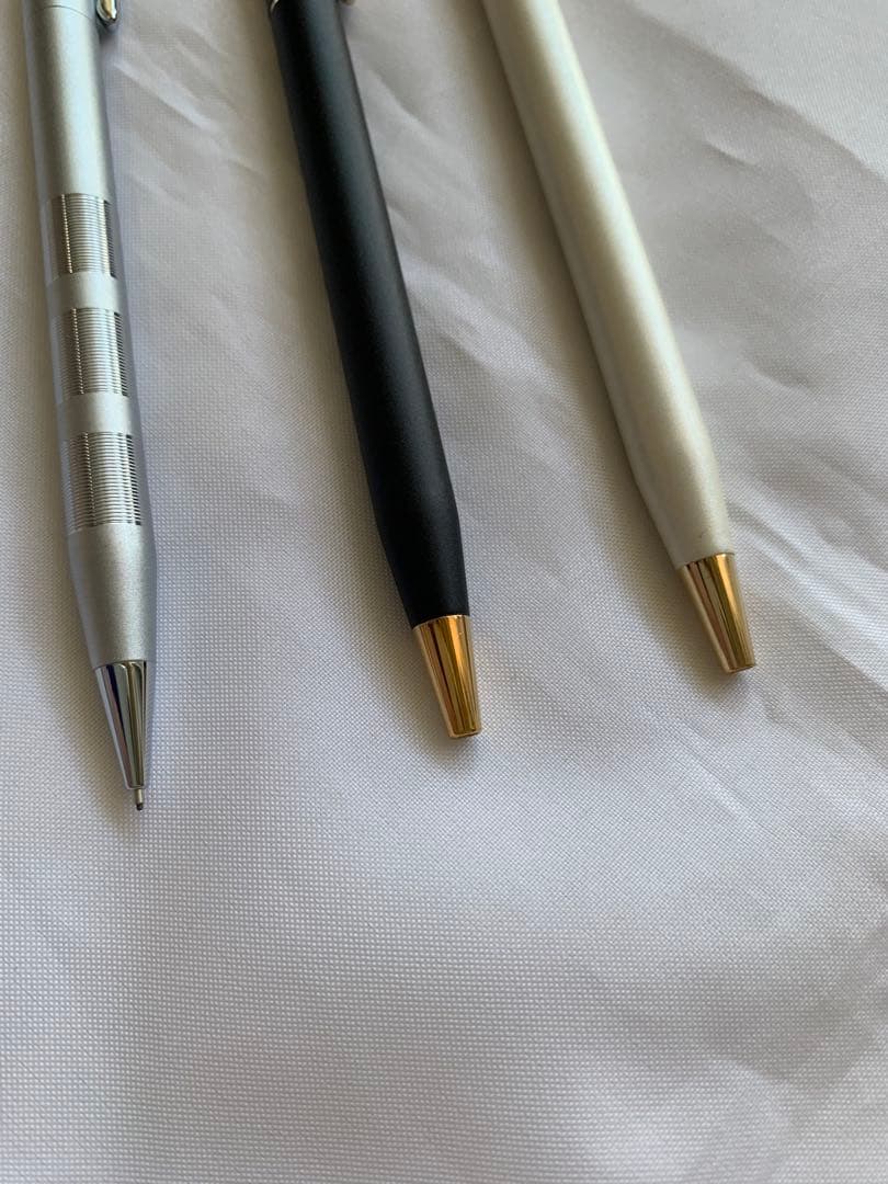 CROSS ballpoint pen set with two pens in black and white and one silver mechanical pencil